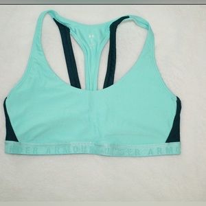 Teal/dark turquoise sports bra. Flattering back with padded support. Size Large